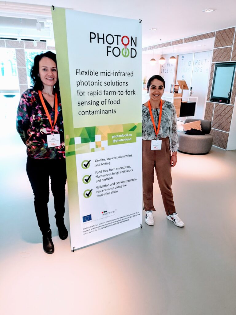 Miriam and Volha with the PHOTONFOOD roll-up.
