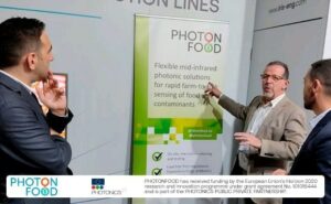 A. Rosales and J. Ortega explaining the PhotonFood concept to the Trade Show Director, Mr. Sergi Fabregat
